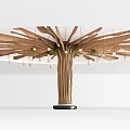 Wooden Tree Sculpture With Expanded Branches Hanging Lights And Green Plants