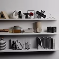 Inflatable Decorative Models Display On White Shelf With Geometric Ornaments And Books