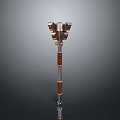Ornate War Hammer With Metallic Decorative Head Red Grip And Shiny Shaft