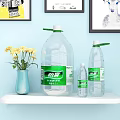 Mineral Water in Different Bottle Sizes Displayed on Light Blue Shelf with Yellow Flowers