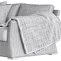 Rattan Outdoor Sofa With Beige Woven Design And Grey Cushions