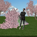 Scenic Floral Installation With Pink Cherry Blossoms Green Grass Blue Sky And Person Standing