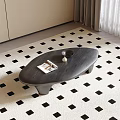 Dark Wooden Oval Coffee Table With Magazine And Decorative Item On Checkered Rug