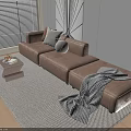 Modern Beige Sectional Sofa In Living Room With Rug Throw Pillows And Decorative Ball