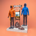 KAILAS Outdoor Clothing Display With Mannequins In Orange And Blue Hooded Jackets And Rock Decorations