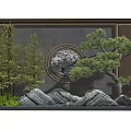 Traditional Chinese Garden Wall With Circular Relief Pine Tree Rockery And Green Plants