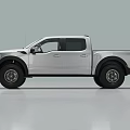 Silver Pickup Truck With Crew Cab Large Off Road Tires Black Grille And Cargo Bed