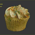 Delicious Cupcake With White Frosting And Colorful Sprinkles On Paper Liner