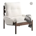 Plush White Fabric Accent Chair with Wooden Frame and Gray Fringed Throw in Modern Design