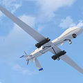 Intelligent US Air Force Drone Flying In Clear Blue Sky With Extended Wings