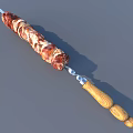 Grilled Juicy Marinated Meat Kebab on Metal Skewer with Wooden Handle