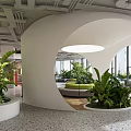 Modern Office Open Space Design With Comfortable Sofa Tables And Green Plants