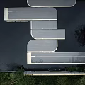 Tranquil Garden Landscape Featuring Curved Pathways Reflecting Water And Lush Greenery