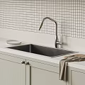 Stainless Steel Kitchen Sink With Silver Faucet Grid Tile Backsplash Light Countertop White Cabinets