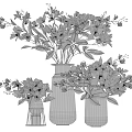 White Flowers with Green Leaves in Decorative Vases Featuring Golden Rims and Transparent Bodies