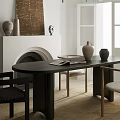 Modern Restaurant Interior With Black Dining Table Chairs Chandelier And Art Decor