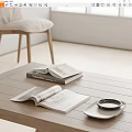 Open Magazines And Stacked Books On Wooden Coffee Table In Minimalist Living Room