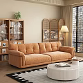 Orange Velour Sectional Sofa with Woven Rattan Screen Wooden Bookshelf and Round Coffee Table