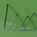 Assorted Metal Strips With Hooks Displayed On Green Background Surface 3d model