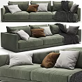 Comfortable Green Sectional Sofa With Mixed Color Cushions And Dark Throw Blanket 3d model