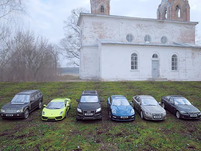 Different Cars Parked On Grass Near Old Building 3d model