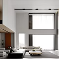 Bright Modern Minimalist High Ceiling Living And Dining Room With Comfortable Sofa And Large Windows