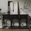 Modern Entryway Console Table With Black Design Gold Handles And Decorative Vases Artwork Plants