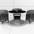 Round Wicker Outdoor Table with Three White Cushioned Chairs and Small Bowl