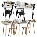 Modern White And Black Desk Design With Wooden Chairs And Stationery Items