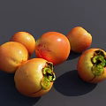 Fresh Ripe Persimmons With Vibrant Orange Skin And Green Calyx On Dark Background