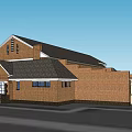 Brick Office Building With Black Roof Multiple Windows And Red Canopy