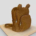 Brown Fluffy Backpack With Ear Shaped Decorations And Zipper Pocket On Wooden Board