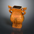 Carved Bronze Square Vessel With Dragon Shaped Handles And Intricate Patterns