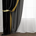 Luxurious Black Curtains With Gold Trim And White Sheer Curtains Against White Walls