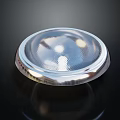 Glossy Transparent Round Object With Silver Edge And Reflective Surface