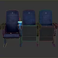 Three Blue And Gray Cinema Seats With Drink In Cup Holder
