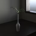 Slim White Vase With Green Leaves On Dark Wooden Table Near Window