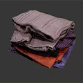 Stacked Colorful Textured Towels In Various Hues Purple Red And Blue