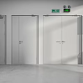 Building Interior Featuring Grey Doors Red Fire Equipment Green Signs White Walls And Grey Floor