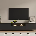 Modern TV Stand With Flat Screen TV And Decorative Items Like Vase Fruits And Frame