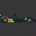 Green And Yellow Single Seat Racing Car With Streamlined Body And Rear Wing