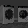 Two Modern Washing Machines With Transparent Circular Doors Silver Black Finish And Digital Controls