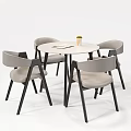 Modern Round White Dining Table With Light Gray Chairs And Black Legs 3d model