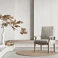 Gray Linen Accent Chair With Wooden Frame And White Sculptural Tree Decoration In Minimalist Interior