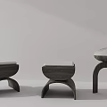 Three Modern Wooden Stools With Upholstered Seats And Unique Curved Leg Designs