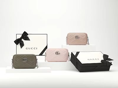 GUCCI Quilted Bags And Bow Accent Boxes In Gray Pink Black Displayed On White Platforms 3d model