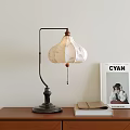 Vintage Table Lamp With Curved Metal Arm And Patterned Fabric Lampshade On Wooden Cabinet