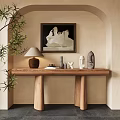 Elegant Wooden Console Table With Sculptures Lamp Books And Wall Artwork Near Green Plants