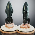 Two Decorative Dark Rocket Figurines With Circular Base And Cloud Like Bottom Details 3d model