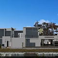 Modern Detached Villa With Large Glass Windows And Lakeside Terrace View